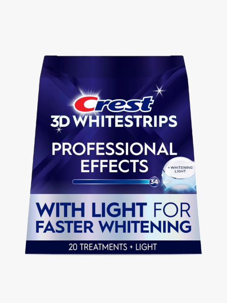 Crest 3D Whitestrips Professional White and LED Accelerator Light in branded component on a light gray background